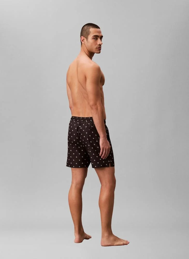 CALVIN KLEIN  Solid Swim Shorts for Men | Best Price UAE